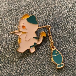 Adorable kawaii cute Green & white cat w/dangling fish on pole enamel pin